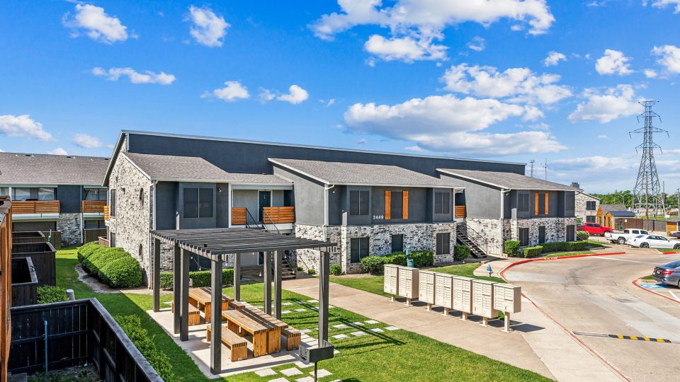 a large building with a lot of windows on top of it